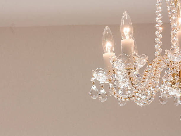 istock Crystal glass glittering chandelier 628067500