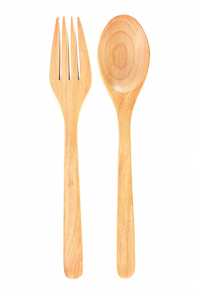 istock Wooden spoon and fork isolated on a white background 628067820