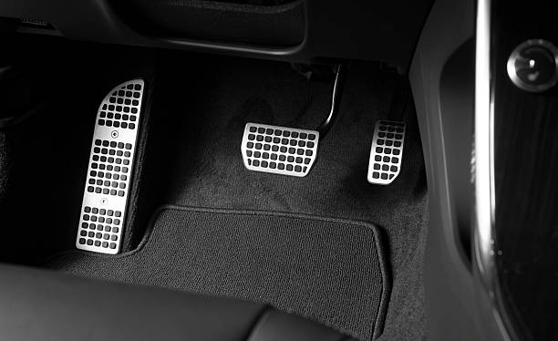 Brake and accelerator pedal stock photo