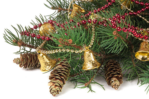 istock decorated Christmas fir branch isolated on white background 628068646