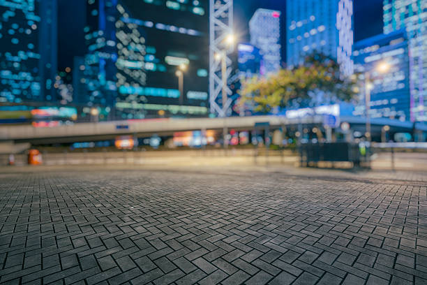 istock empty tiled floor with blurred cityscape of Hong Kong background 628069476