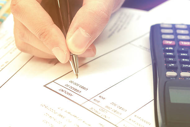 istock Close up businesswoman calculating data analyzing in office. 628069784