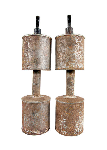 istock Two long old kerosene lamp isolated on white background. 628075290