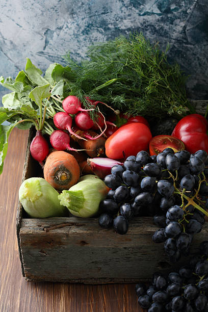 istock Organic fruits and vegetables in crate 628079050