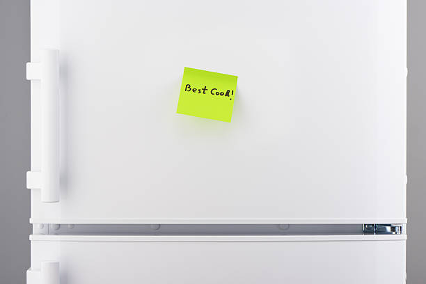 istock Best cook note on green sticky paper on white refrigerator 628084002
