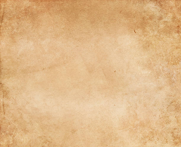 istock Old yellowed and stained paper texture. 628084660