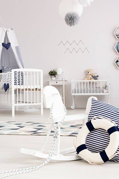 istock Room with rocking horse and cradle 628085678