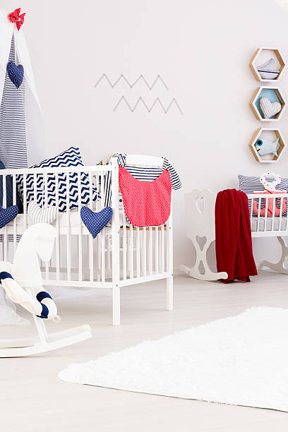istock Crib and rocking horse in room 628085702