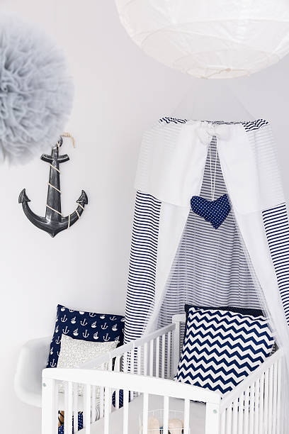 istock Nautical baby bed with canopy 628085748