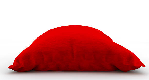 istock Royal red velvet pillow isolated on white background 628086292