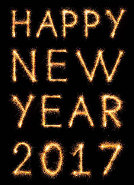 istock HAPPY NEW YEAR 2017 lettering drawn with bengali sparkles 628086670