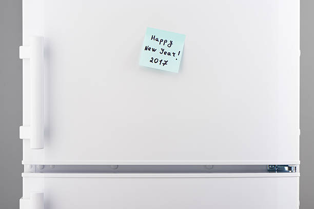 istock Happy New Year 2017 note on white refrigerator door 628087418