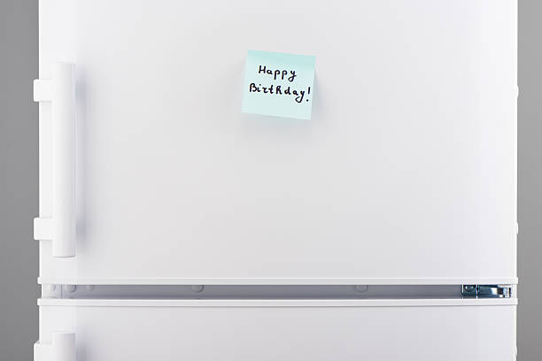 istock Happy Birthday note on white refrigerator door 628087470