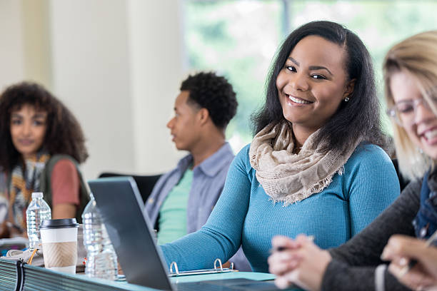 istock Beautiful African American college student before class 628087752