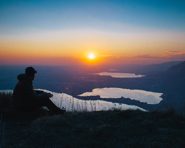 istock Hiker on top of the mountain during sunset 628089490