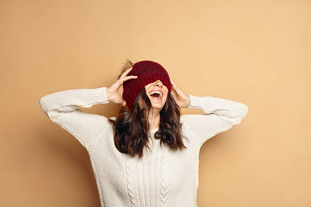 istock Girl in Knitted Sweater and Beanie Hat 628091788