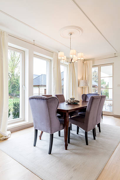 istock Room with wooden table and chairs 628092080