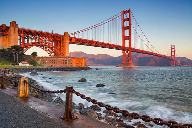 San Francisco. Image of Golden Gate Bridge in San Francisco, California during sunrise. golden gate bridge stock pictures, royalty-free photos & images