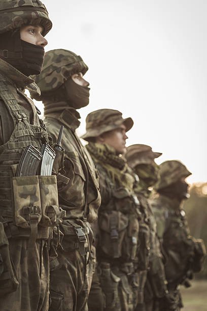 istock Training soldiers with weapon in army 628095922