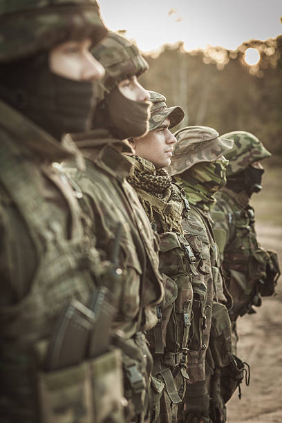 istock Heavily armed soldiers in a row 628096000