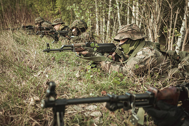 istock Masked soldiers training military strategy 628096002
