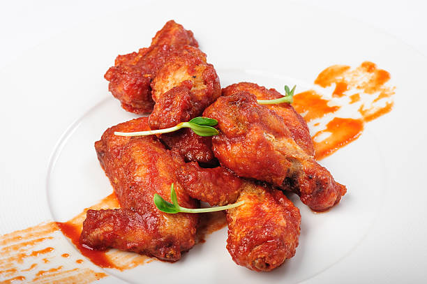istock roasted chicken legs in red caramel sauce 628096312