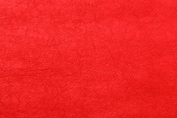 istock Dark red background from japanese hand made paper texture 628097062