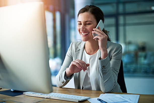 istock She's genuinely happy to hear from her clients 628097072