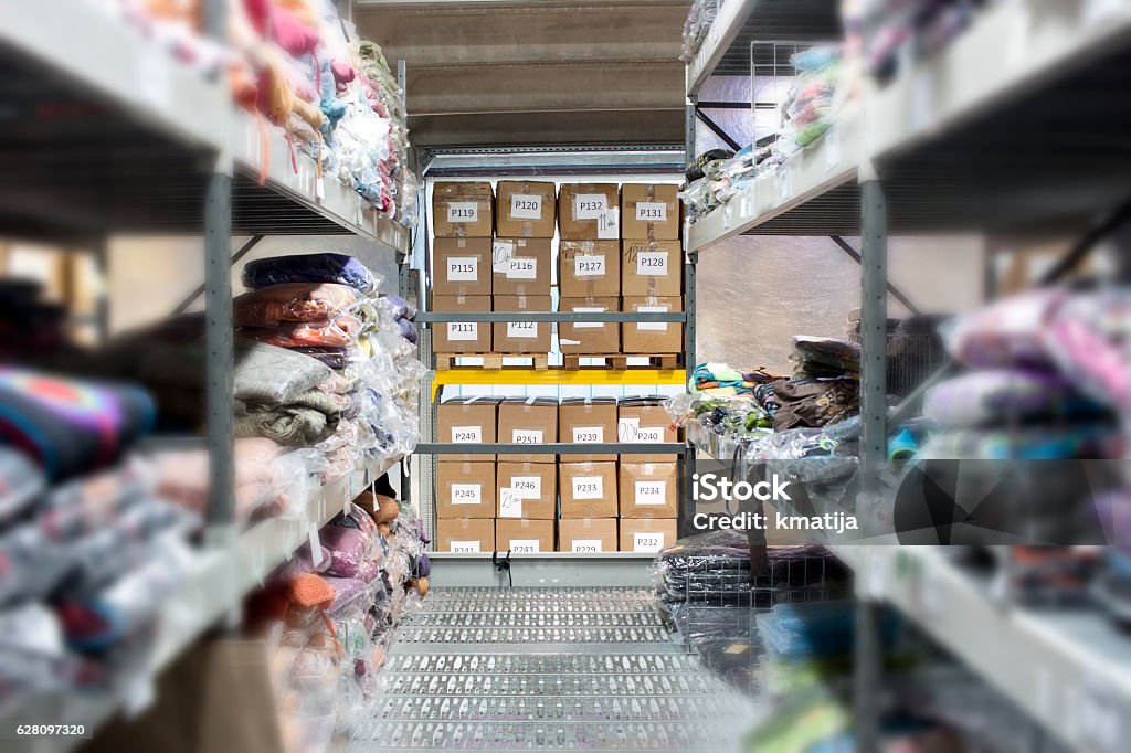 Wholesaling Warehouse Stock Photo - Download Image Now - Clothing, Warehouse,  Storage Room - iStock