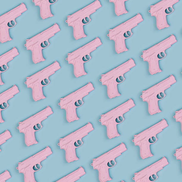 istock Colorful pastel pattern made of pink handguns. Minimal flat lay 628098208