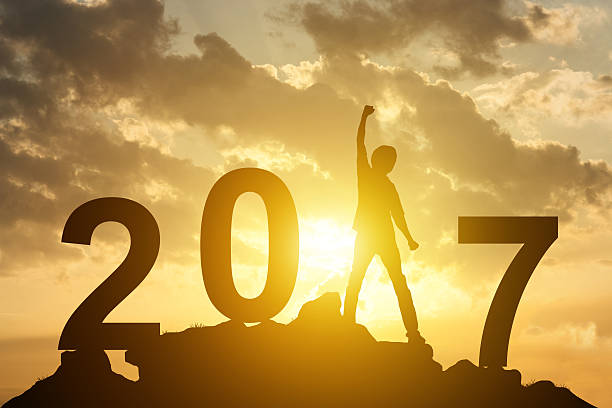 istock Man hand up on the peak of mountain  text 2017 628098348