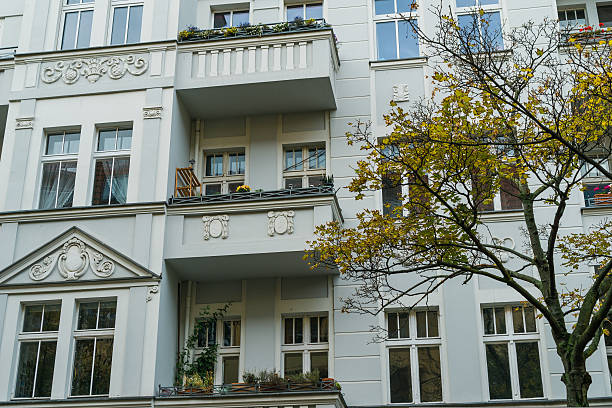 istock beautiful apartment building at autumn 628100168