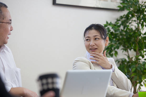 istock Happy Japanese Office Lady 628101644