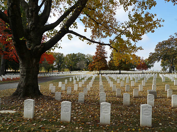 Fort Smith National Cemetery Tombstones at Fort Smith National Cemetery, Fort Smith, Arkansas, Fall of 2016. No people are in this photo.  The cemetery covers 22.3 acres, and as of 2005 had 13,127 interments. Built in 1867. national cemetery stock pictures, royalty-free photos & images