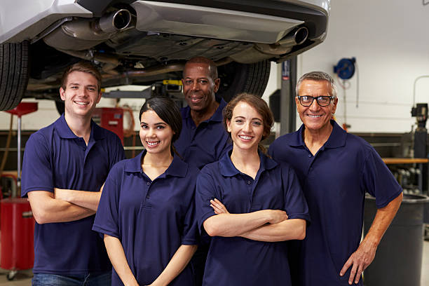 istock Portrait Of Auto Mechanics Working In Garage 628110752