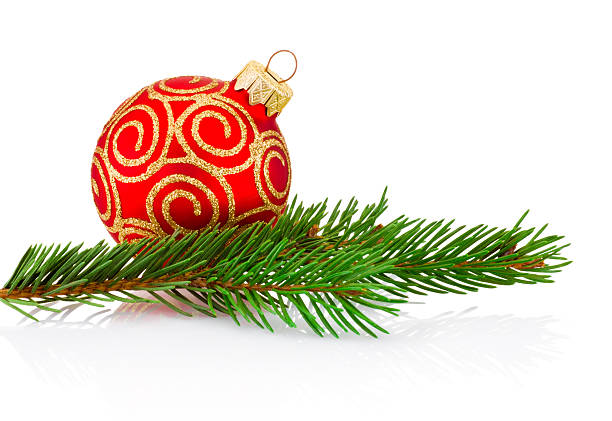 istock Christmas red decoration bauble and fir tree branch Isolated 628111168