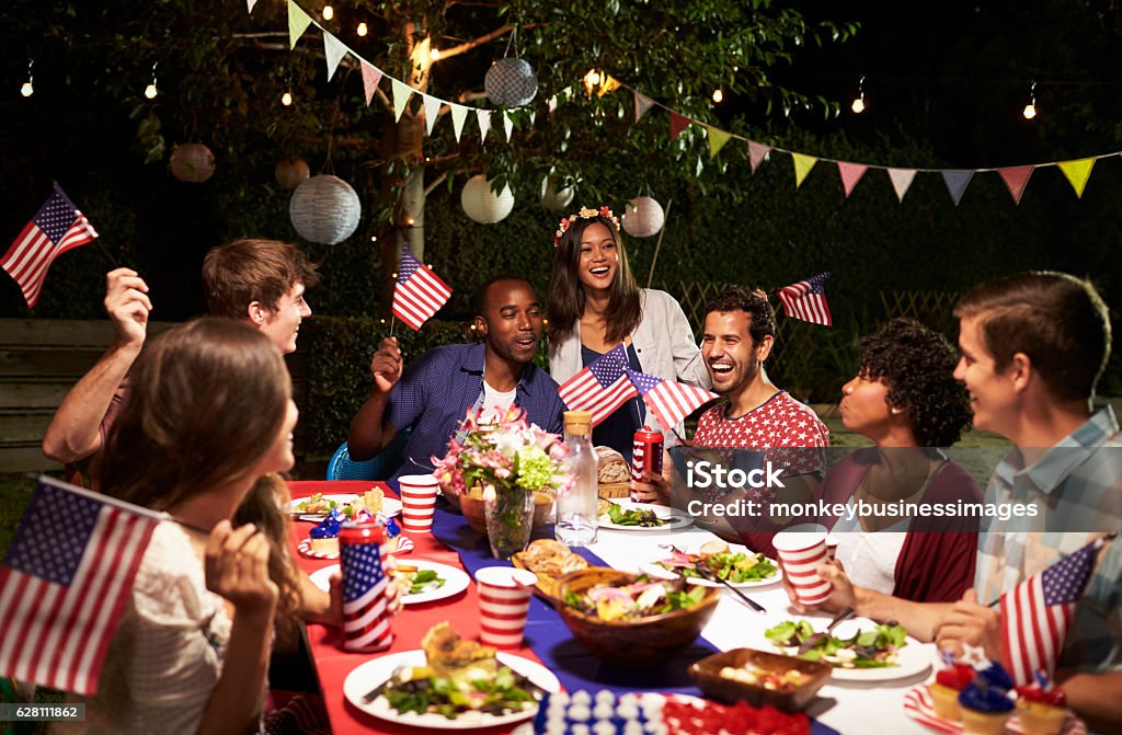Friends Celebrating 4th Of July Holiday With Backyard Party Fourth of July Stock Photo