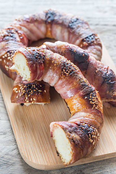 istock Bagels with sesame wrapped in bacon rashers 628117240
