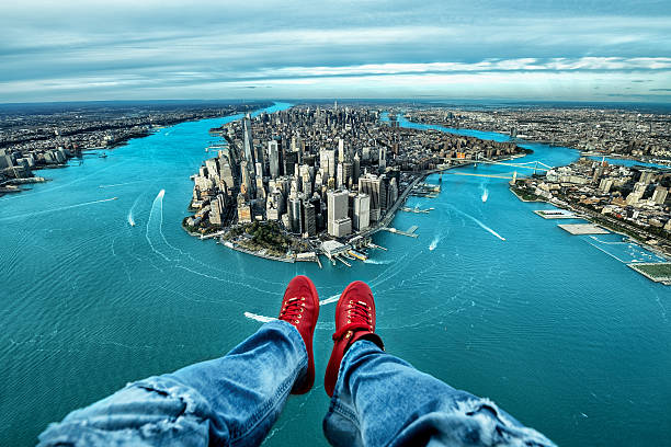 POV image of Manhattan island in New York City during helicopter flight.