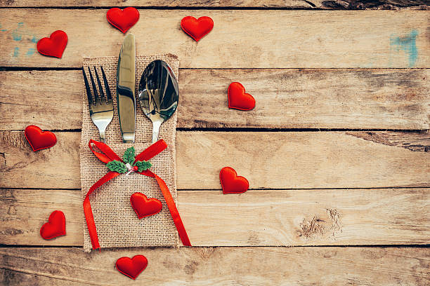 istock Table set for celebration Valentine's Day. Wooden table place se 628120606