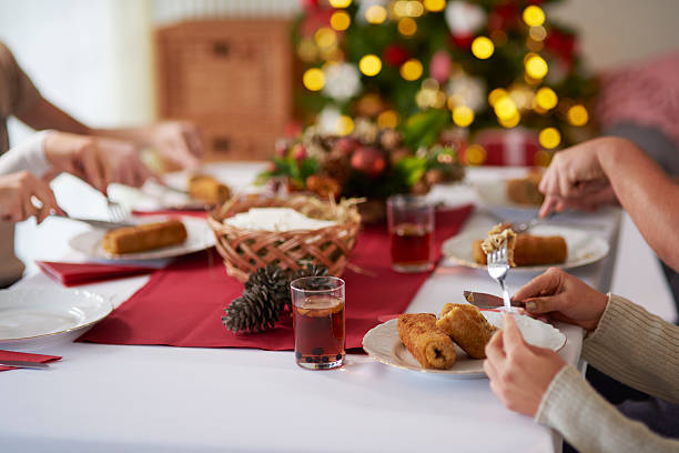 istock People eating croquette over Christmas table 628121250