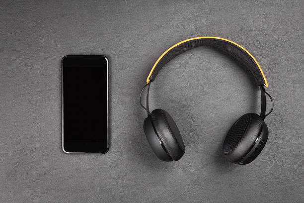 istock Black modern smartphone and headphones 628121334