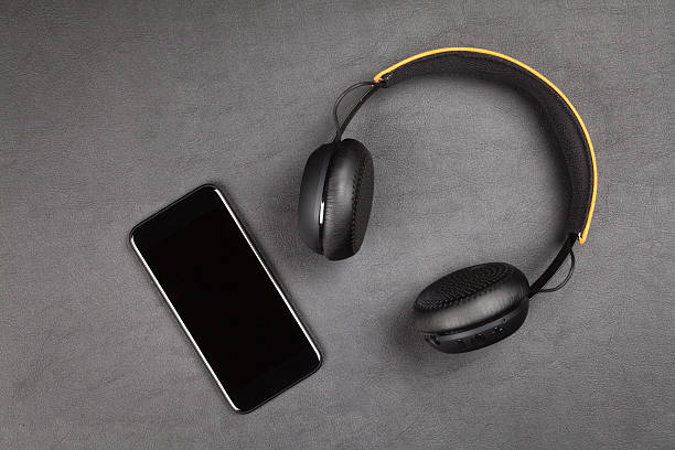istock Black modern smartphone and headphones 628121434