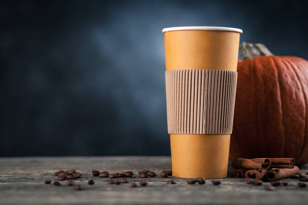 istock Pumpkin spice latte in a paper cup 628121988