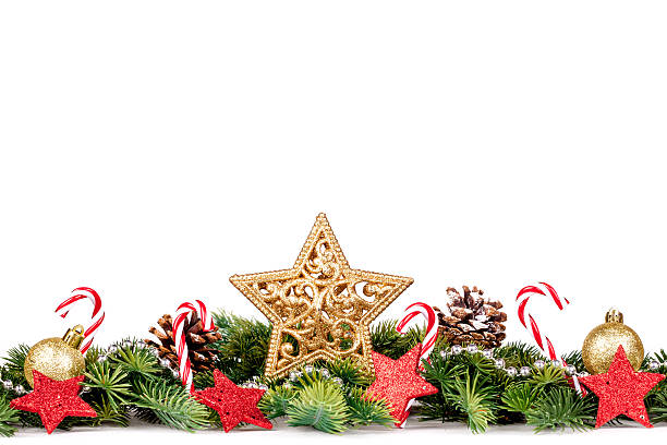 istock Christmas Border - tree branches with golden balls, candy and 628122176
