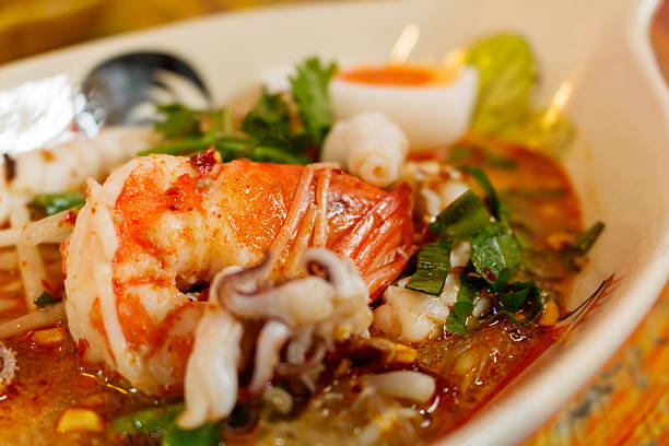 istock Tom Yum noodle mixed with shrimp squid pork and egg 628122710