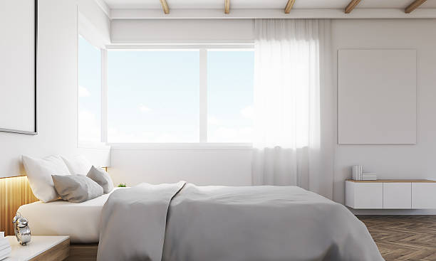 istock Side view of bedroom with sofa and framed poster 628124556