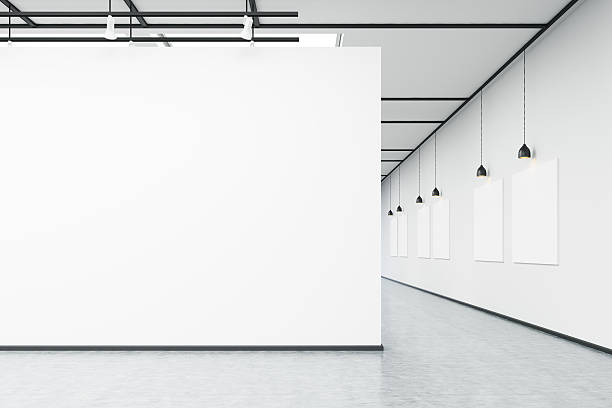 istock Art gallery with large white wall and pictures 628130826