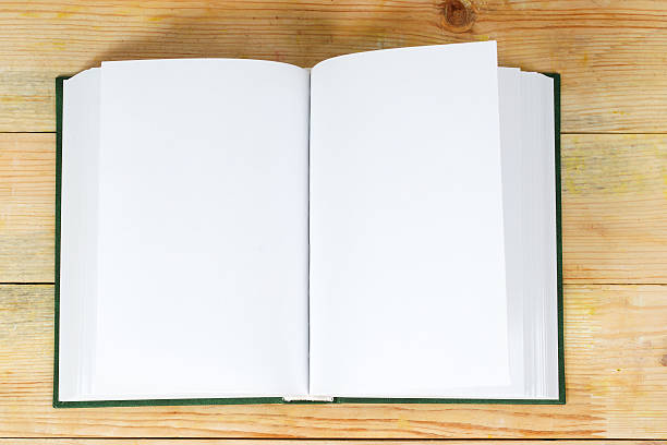 istock Open book on wooden table. Back to school. Copy space 628131576