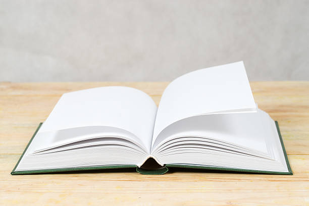 istock Open book on wooden table. Back to school. Copy space 628132080